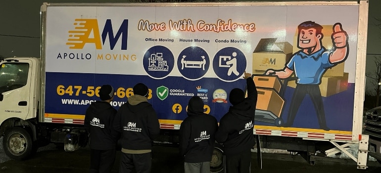 California intrastate movers posing in front of a truck