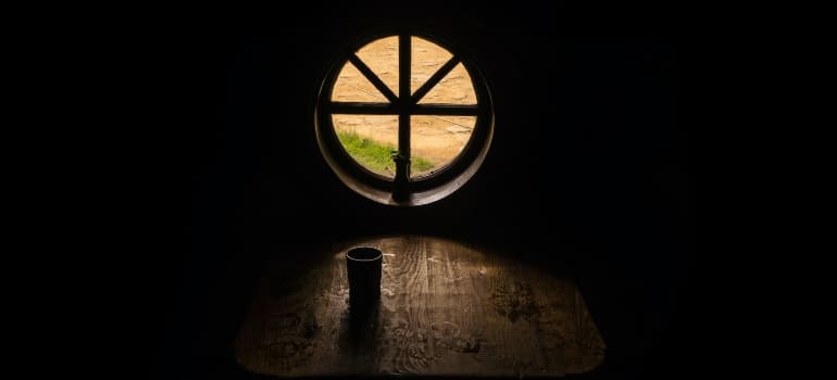 Picture of a window in a dark room